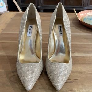 Gold stiletto heels never worn